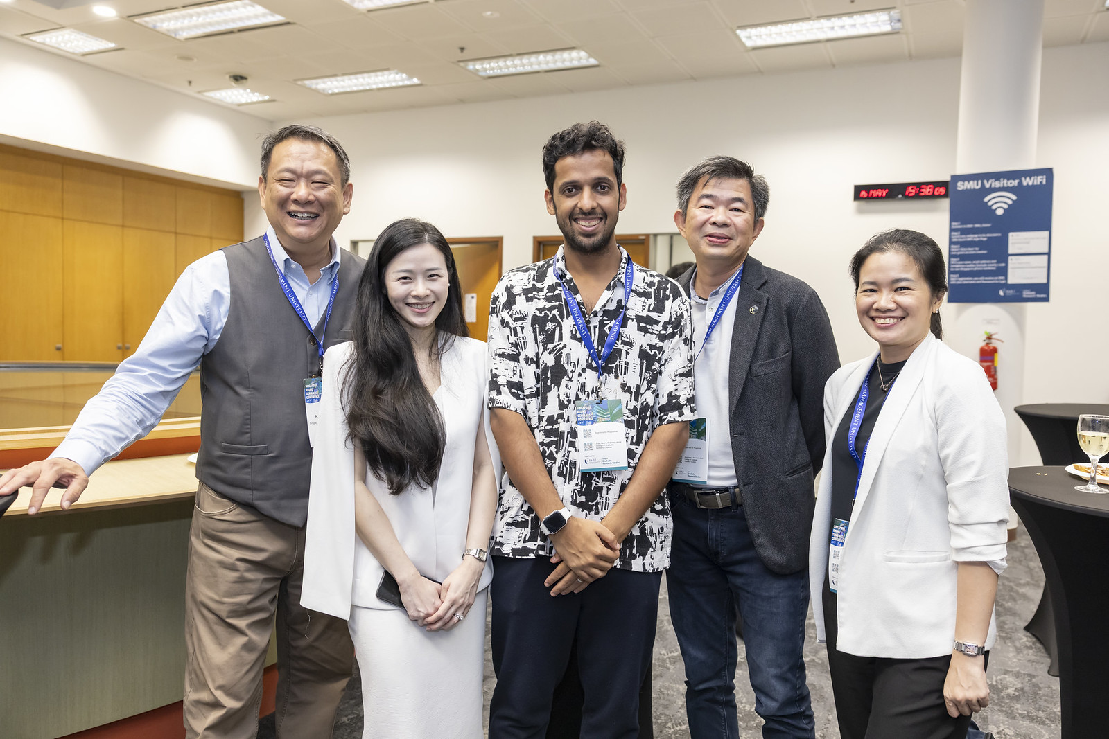 Dr. Neal Jha with team members - Building conversational excellence